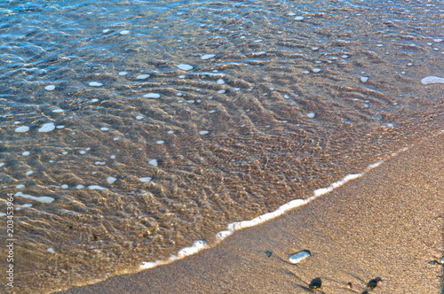 Blue water closeup. Ripples, water background. Small waves in the sea.