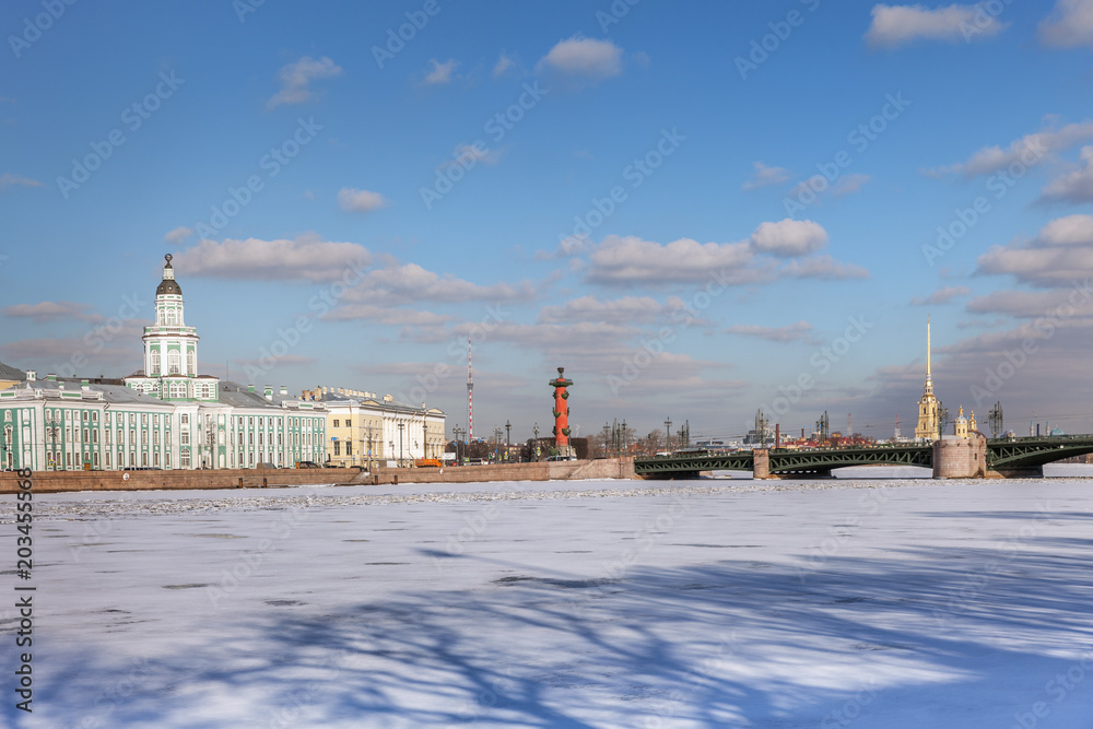 Neva river in winter, Kunstkamera, Palace bridge, Peter and Paul fortress in St. Petersburg