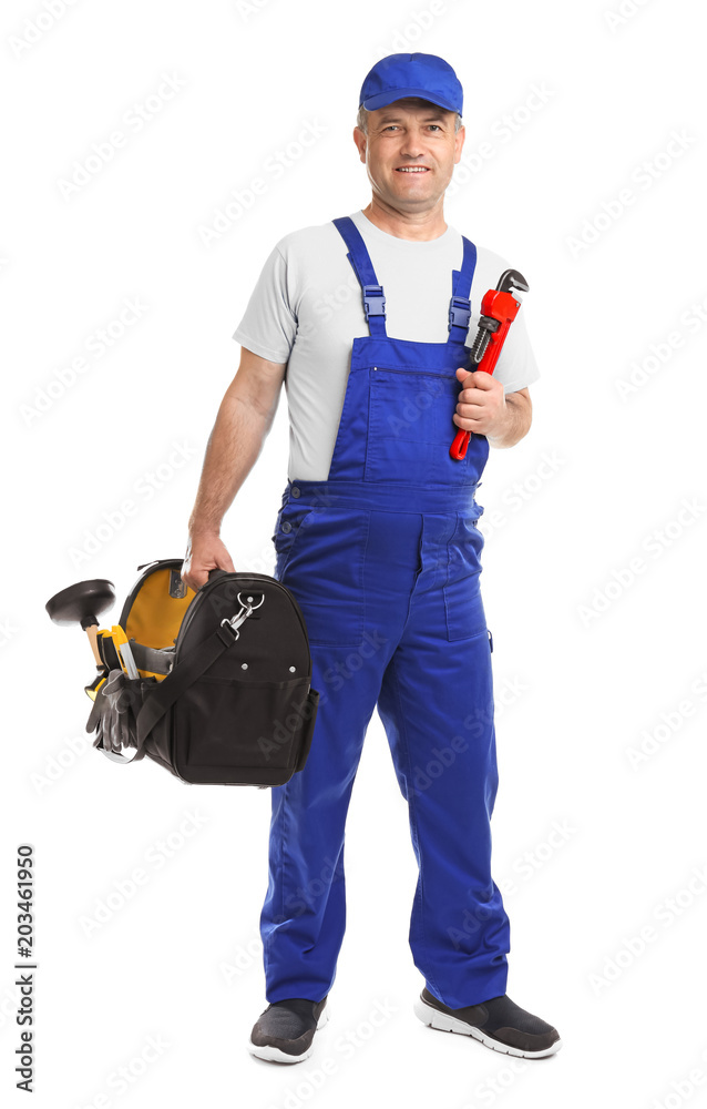 Mature plumber with pipe wrench and tool bag on white background Mature plumber with pipe wrench and tool bag on white background