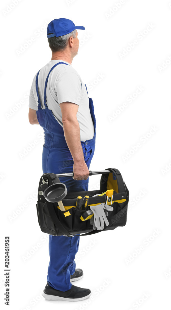 Mature plumber with tool bag on white background Mature plumber with tool bag on white background