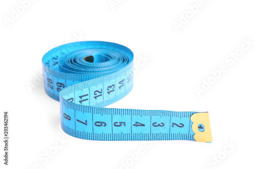 Measuring tape on white background