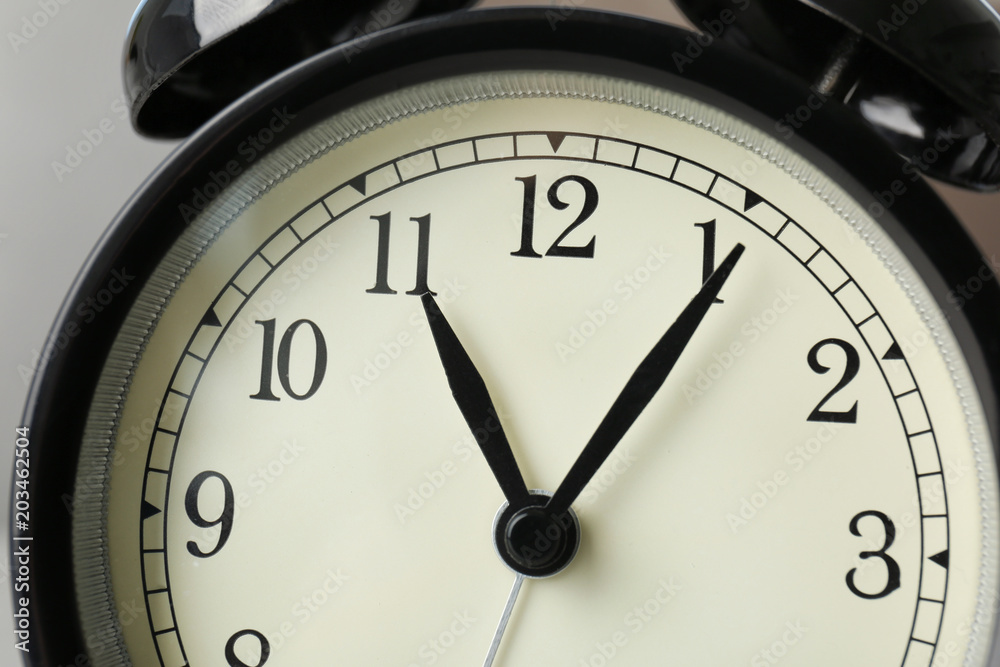 Alarm clock, closeup. Time change concept Alarm clock, closeup. Time change concept