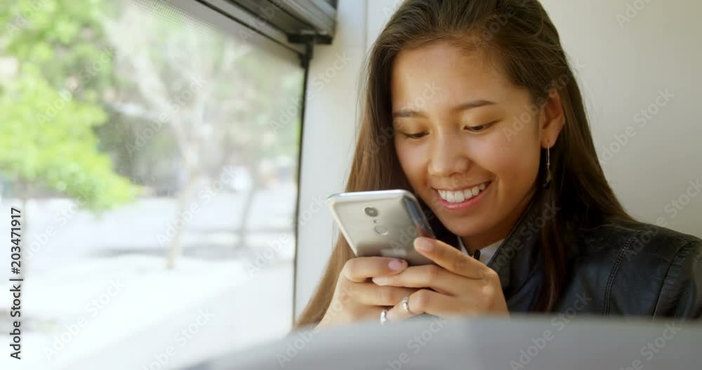 Teenage girl using mobile phone