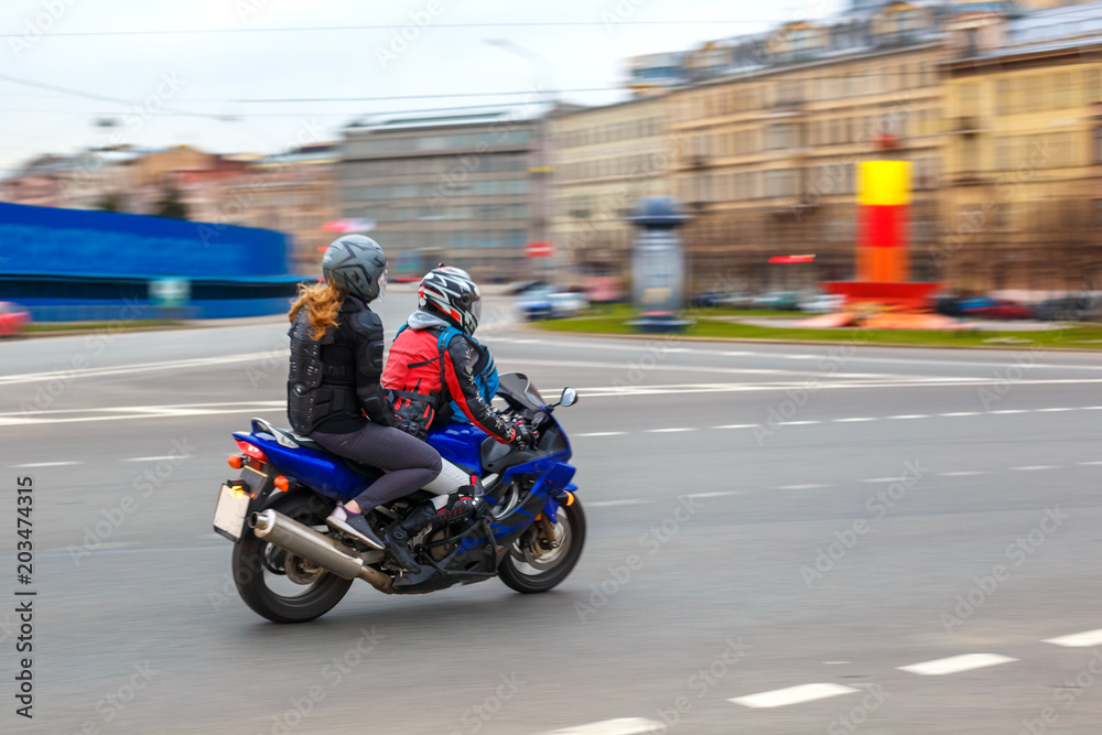 motorcyclist rides at speed on city roads, may 2018, St. Petersburg