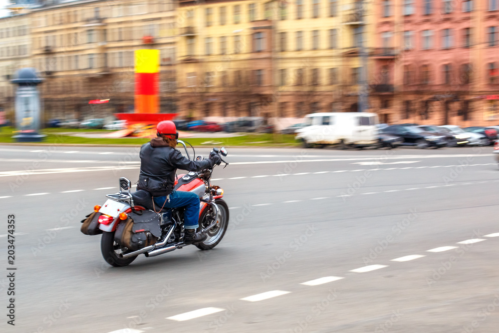 motorcyclist rides at speed on city roads, may 2018, St. Petersburg motorcyclist rides at speed on city roads, may 2018, St. Petersburg