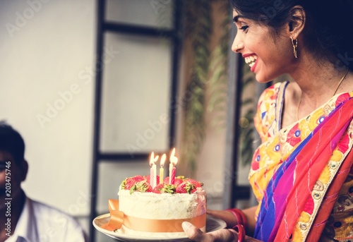 Indian family celebrating a birthday party photo