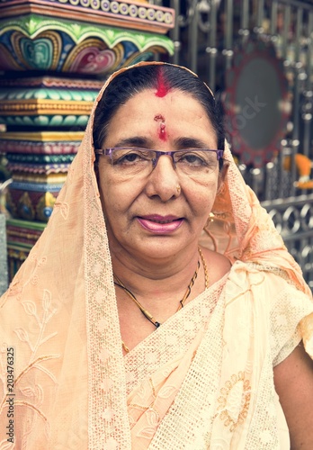 Indian woman portrait at the temple photo