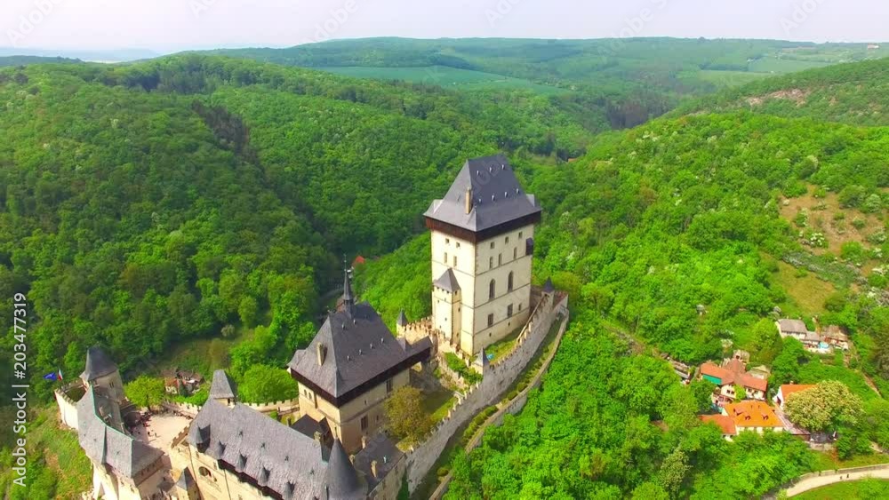 Camera flight around The Karlstejn castle. Royal palace founded King Charles IV. Amazing gothic monument in Czech Republic, Europe. Camera flight around The Karlstejn castle. Royal palace founded King Charles IV. Amazing gothic monument in Czech Republic, Europe.