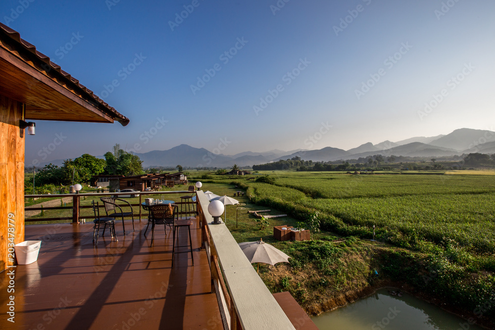 Morning atmosphere with fields and mountains behind. Can be seen from the accommodation. This is a beautiful place in Nan. Northern Thailand