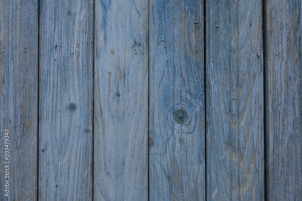 The texture of old wood. Weathered piece of wood. Background of old wood. The texture of old wood. Weathered piece of wood. Background of old wood.
