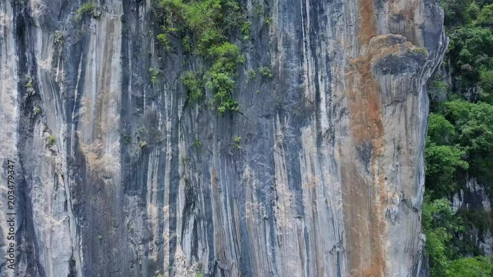 Aerial View of Limestone Rocks Covered with Lush Tropical Greenery. Top View of Mountains in Krabi and Suratthani Provinces, Thailand. Aerial View of Limestone Rocks Covered with Lush Tropical Greenery. Top View of Mountains in Krabi and Suratthani Provinces, Thailand.