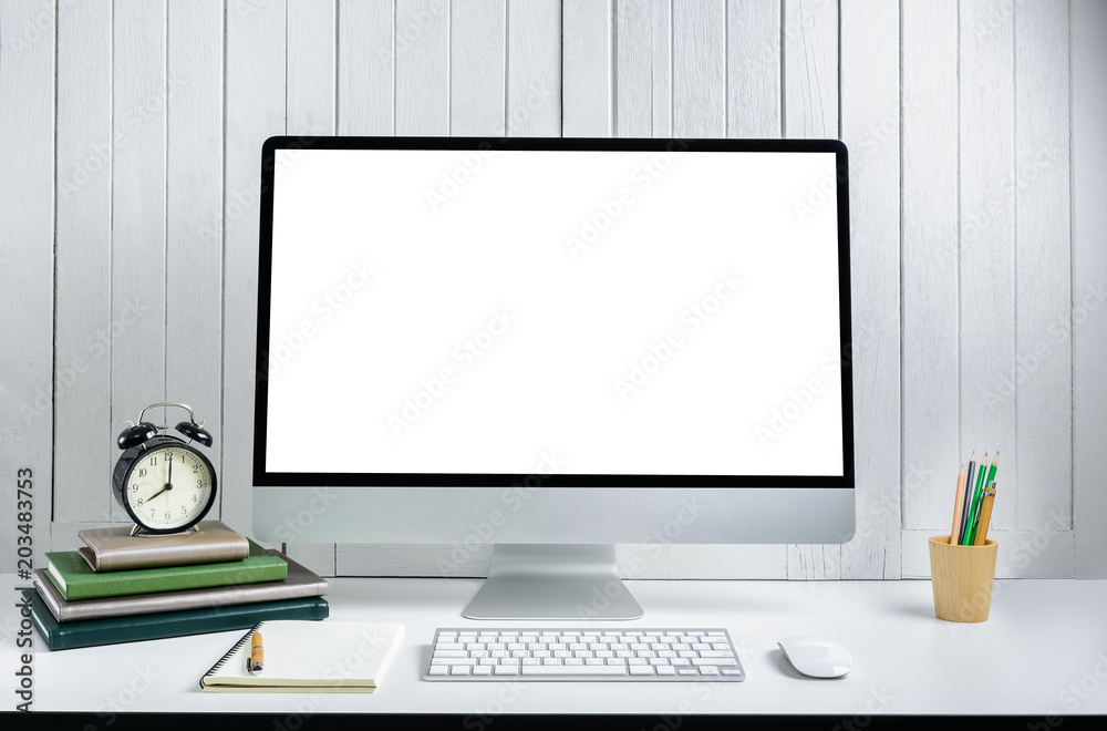 workplace background with Blank white screen modern desktop computer. White wooden vintage blackground workplace background with Blank white screen modern desktop computer. White wooden vintage blackground