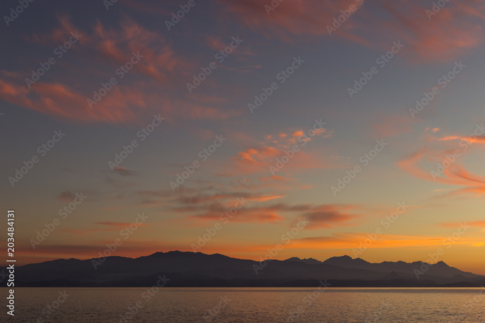 Beautiful sunset from the Cap Corse, with view over the Agriates desert, Corsica, France. Beautiful sunset from the Cap Corse, with view over the Agriates desert, Corsica, France.
