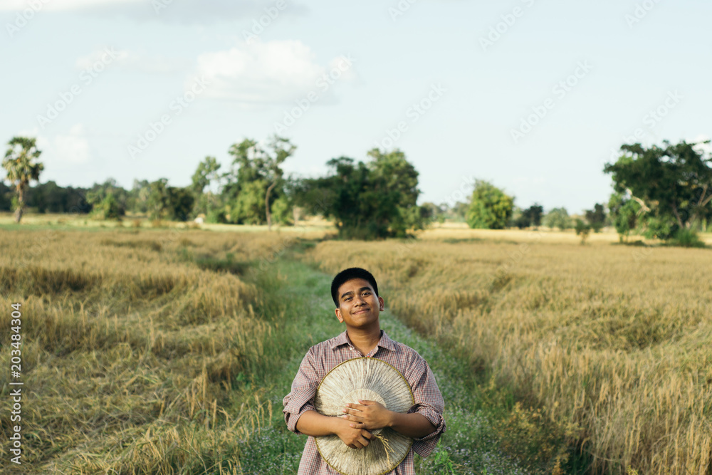 Brown Skin Farmer And His Rice Field Brown Skin Farmer And His Rice Field