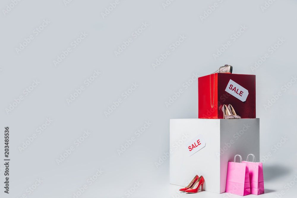 handbag, high heels, shopping bags and sale signs, summer sale concept handbag, high heels, shopping bags and sale signs, summer sale concept