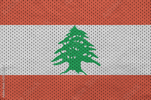 Lebanon flag printed on a polyester nylon sportswear mesh fabric with some folds photo