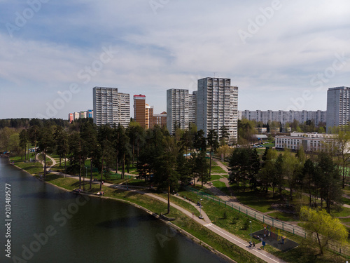 houses on bank of pond in Zelenograd, Russia © olgavolodina