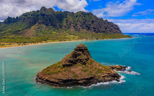 Aerial view Oahu's coastline and Chinaman's Hat island in Hawaii from a helicopter