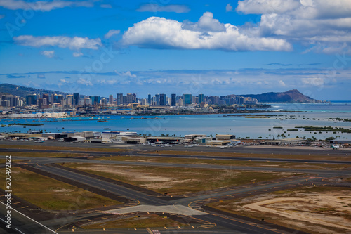 Aerial view of downtown Honolulu and HNL airport in Hawaii photo