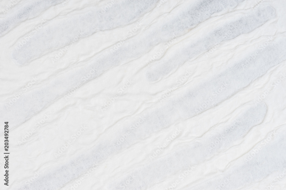 Fototapeta premium White self made paper pressed sheet texture background. Embossed lace pattern.