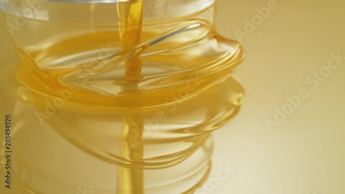 Pouring olive oil. Shot with high speed camera, phantom flex 4K. Slow Motion.