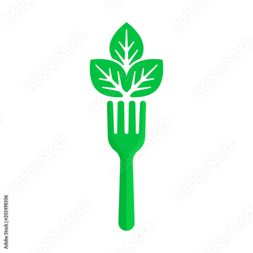 green fork and leaf like vegan food