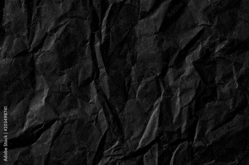 abstract background with black wrinkled paper abstract background with black wrinkled paper