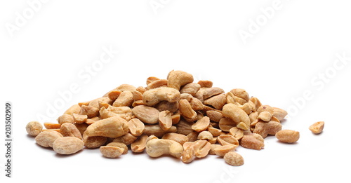 Salted and marinated peanuts with cashew nuts and almonds, pile isolated on white background