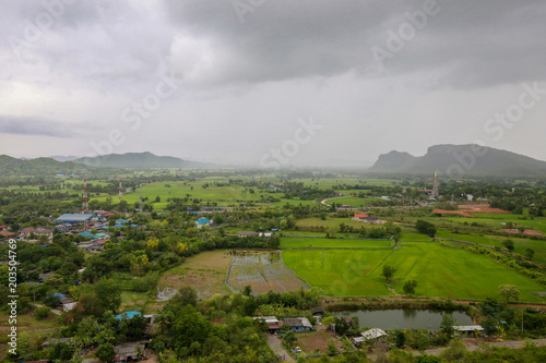 Conutryside with hill, house, land, river and cloud view. very slow life and beautiful landscape in asia. abstract for freedom and planet life