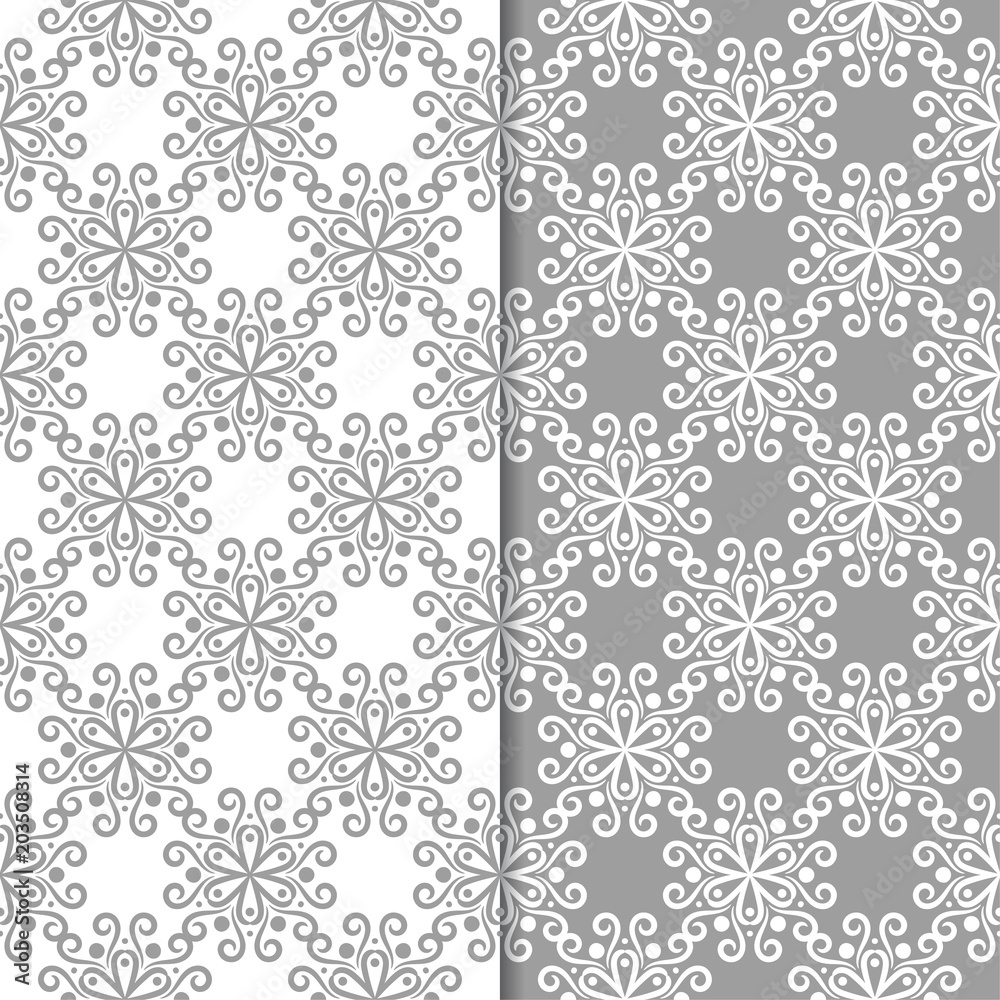 White and gray floral backgrounds. Set of seamless patterns White and gray floral backgrounds. Set of seamless patterns
