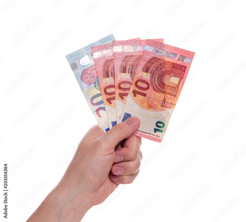 Euro money on white background. The man's hand holds three banknotes of ten euros and one twenty euros in the amount of fifty euros. Euro money on white background. The man's hand holds three banknotes of ten euros and one twenty euros in the amount of fifty euros.