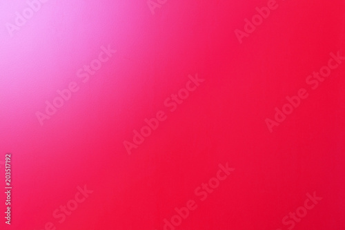 texture of a metal surface painted with bright red paint with a gradient angle