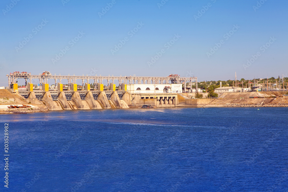 landscape with hydroelectric power station and river water surface 