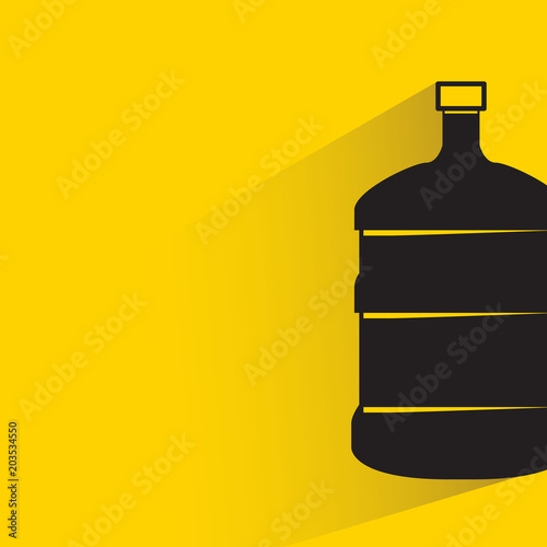 beverage bottle with drop shadow on yellow background