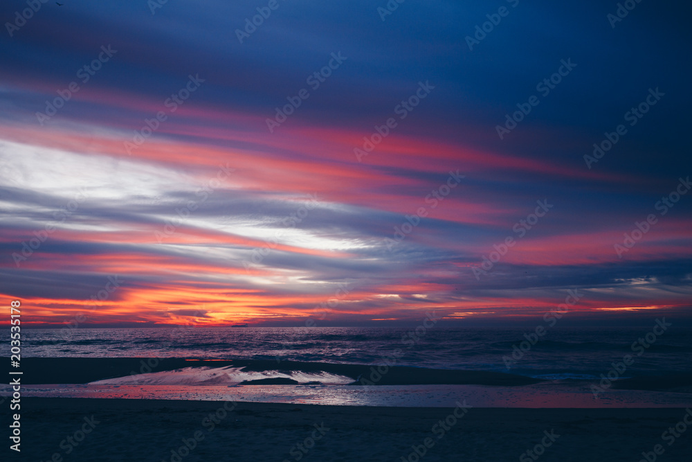 An amazing sunset on the coast at the ocean An amazing sunset on the coast at the ocean