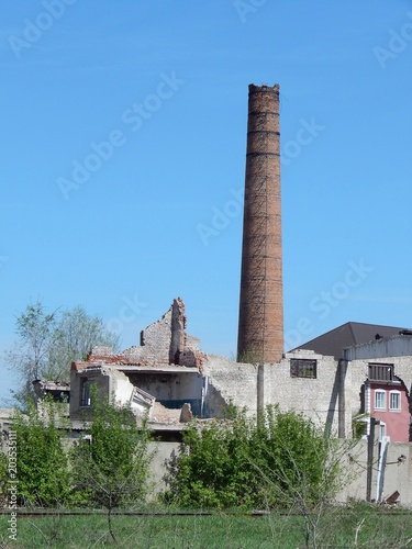 Brick factory chimney. Abandoned enterprise. The old boiler plant.