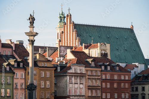 Warsaw old town by Zamkowy square with the cathedral in Poland capital city on a sunny day