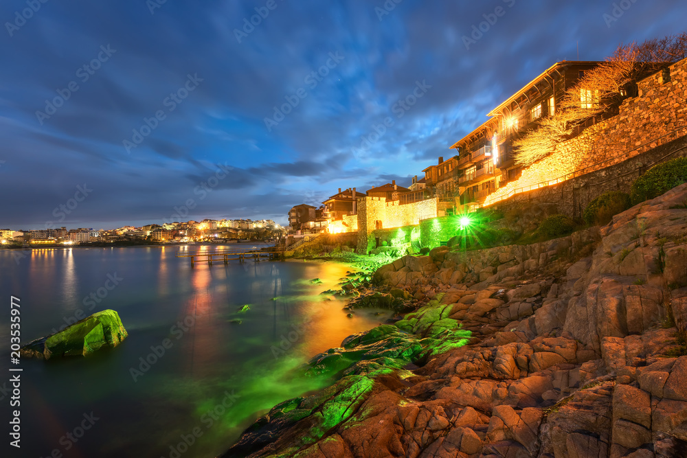 Night view of old town of Sozopol from the sea.