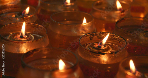 Candle light burning inside Man mo temple