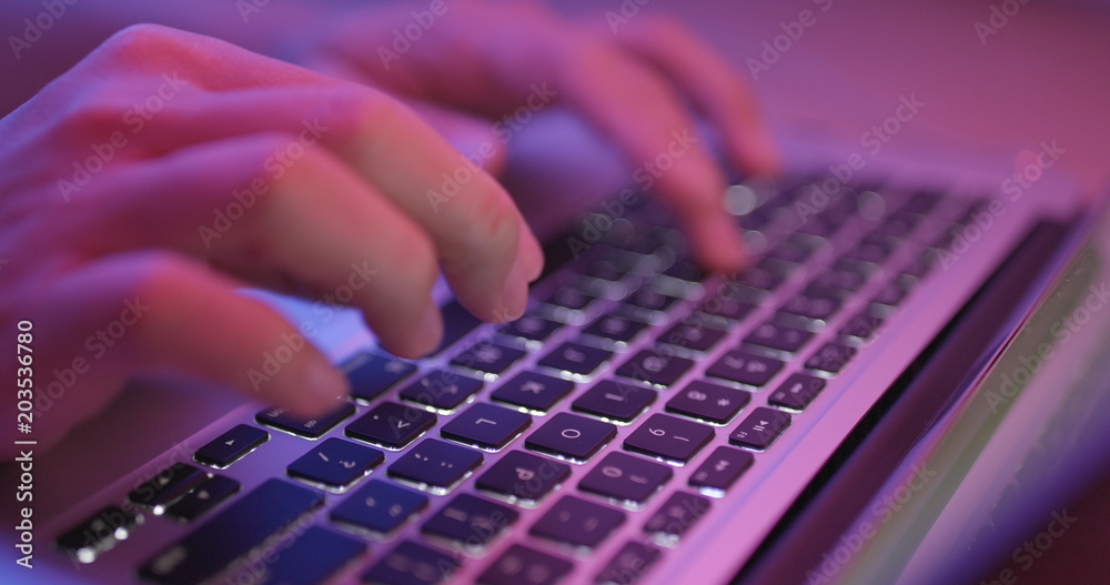 Typing on laptop computer keyboard Typing on laptop computer keyboard