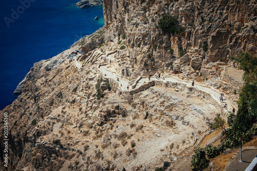 Amorgos,Grecce-August 3,2017.The stone steps leading up to the monastery of Panagia Hozoviotissa photo