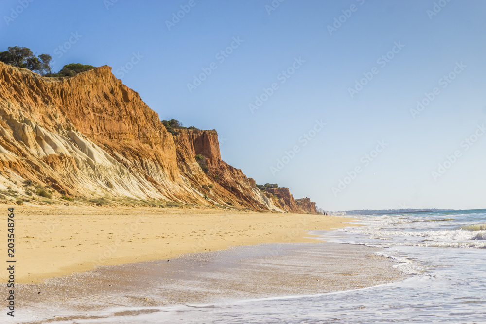Beautiful Falesia beach with high cliffs by Atlantic Ocean, Albufeira, Algarve
