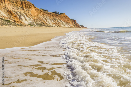 Beautiful Falesia beach with high cliffs by Atlantic Ocean, Albufeira, Algarve © eunikas
