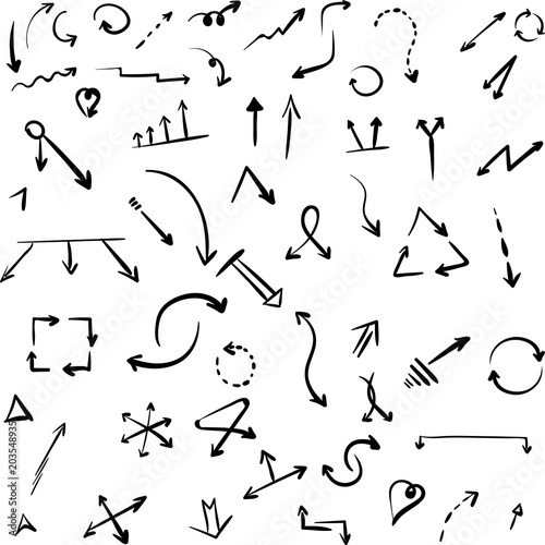 Black hand-drawn arrows and signs isolated on white.