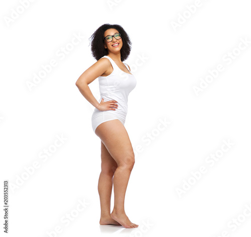 body positive and people concept - happy african american woman in white underwear