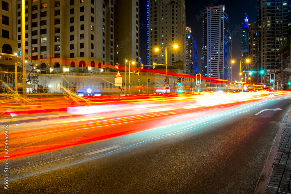 City road night scene, UAE, Dubai, Night traffic long tracers in Dubai