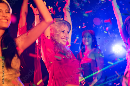Night club dj party people enjoy of music dancing sound with colorful light. club night light dj party club. With Smoke Machine and lights. Lights Laser show party.