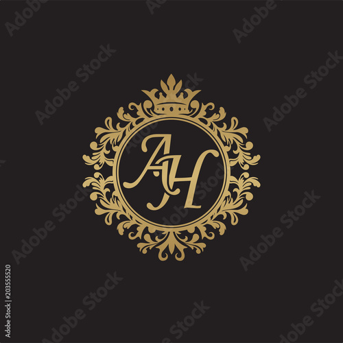 Initial letter AH, overlapping monogram logo, decorative ornament badge, elegant luxury golden color photo