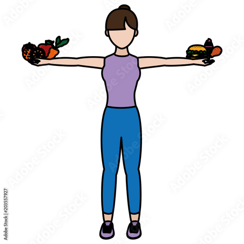 color woman with healthy and unheathy food in her hands photo