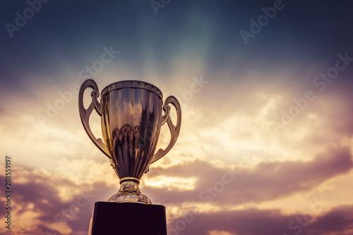 Fotografie, Obraz winner trophy on sky background